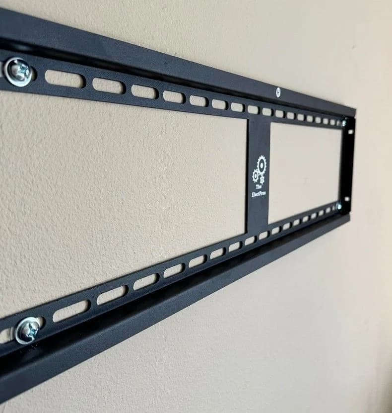 TV mounted over fireplace with hidden cables in Melbourne FL home