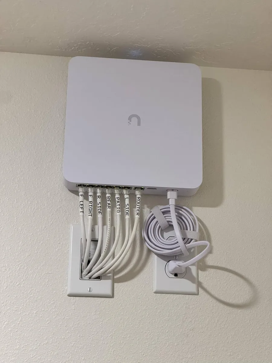 Unifi NVR setup with labeled PoE camera runs in Melbourne FL home