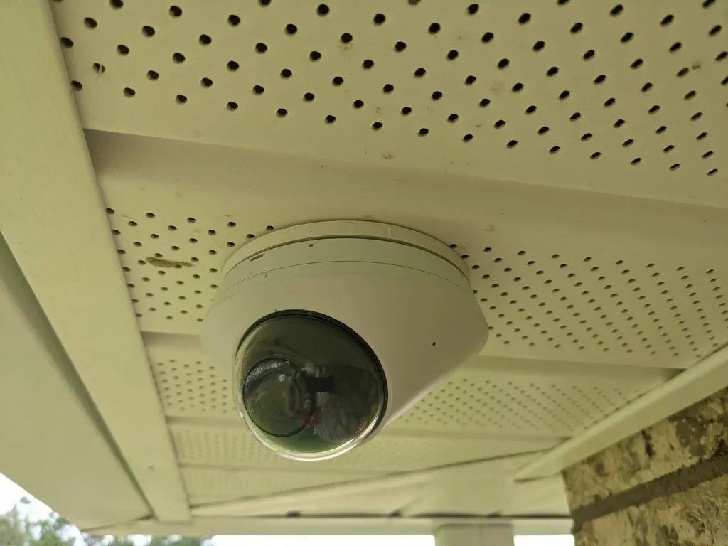 PoE dome security camera installed on a Melbourne, Florida home